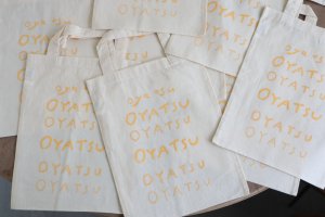 画像: acutti / OYATSU BAG yellow